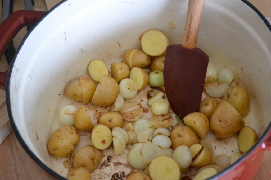 Saute onions, garlic, and potatoes