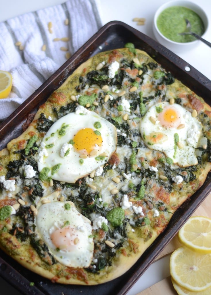 Super Greens Breakfast Pizza - garlicky kale and spinach with pesto and fried eggs - Sarcastic Cooking #brunch