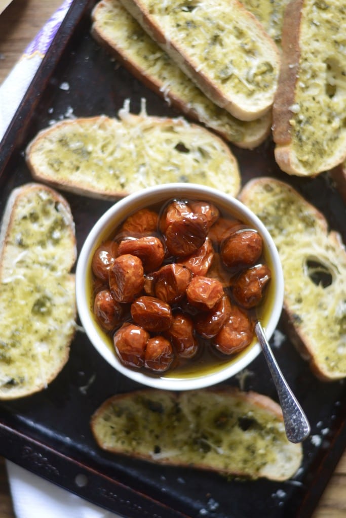 Roasted Tomatoes in Garlic Olive Oil with Pesto Crostini | Sarcastic Cooking