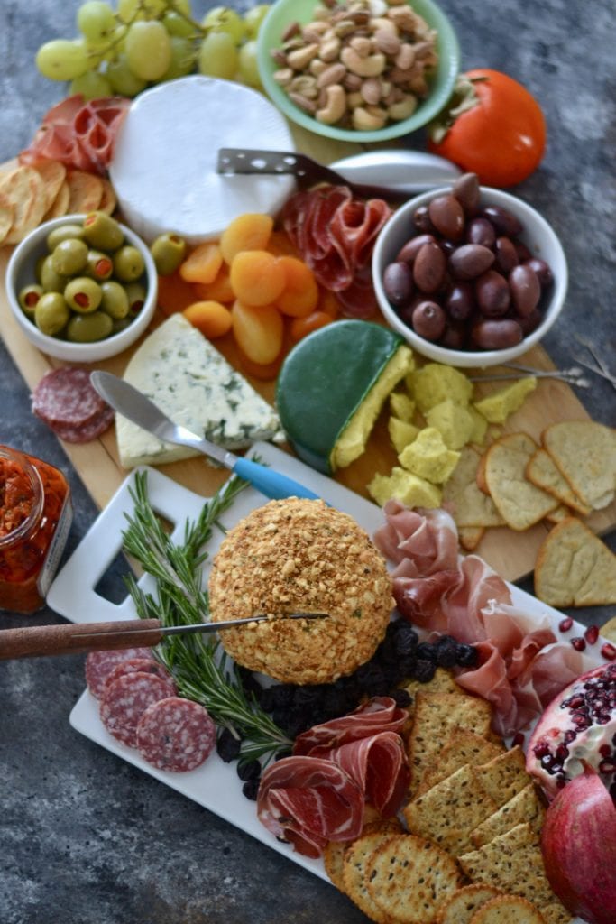 sage-brown butter, cashew, & cracker coated cheeseball and holiday cheese board