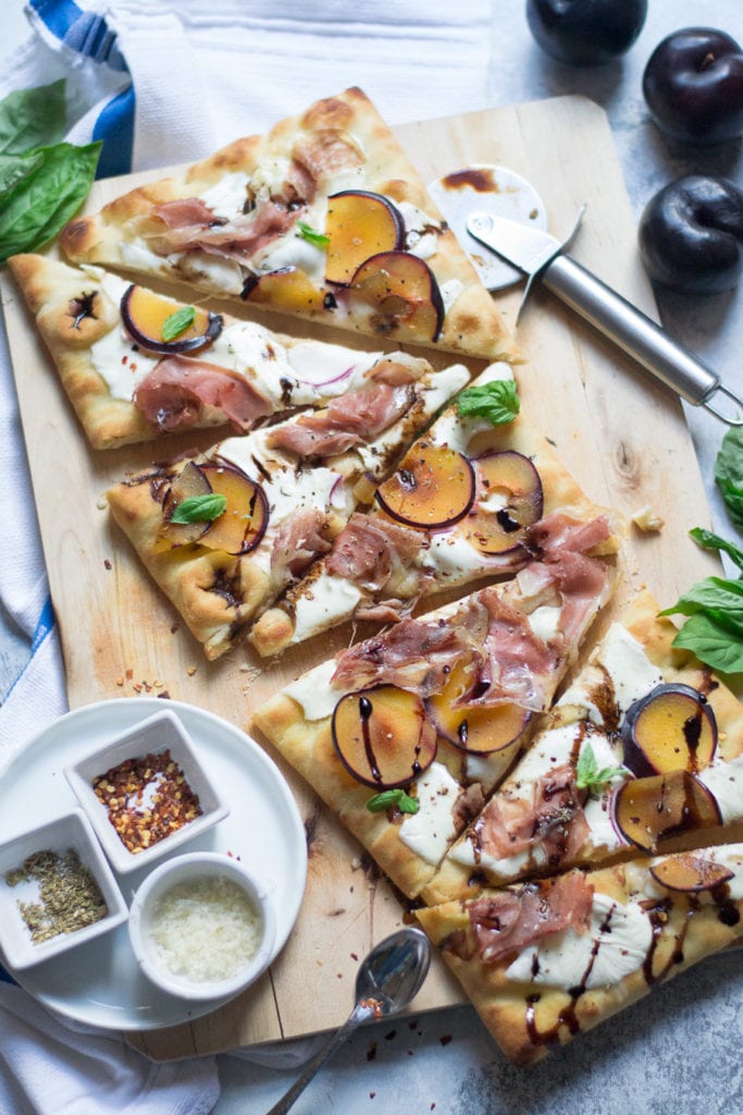 plum, prosciutto, and mozzarella pizza